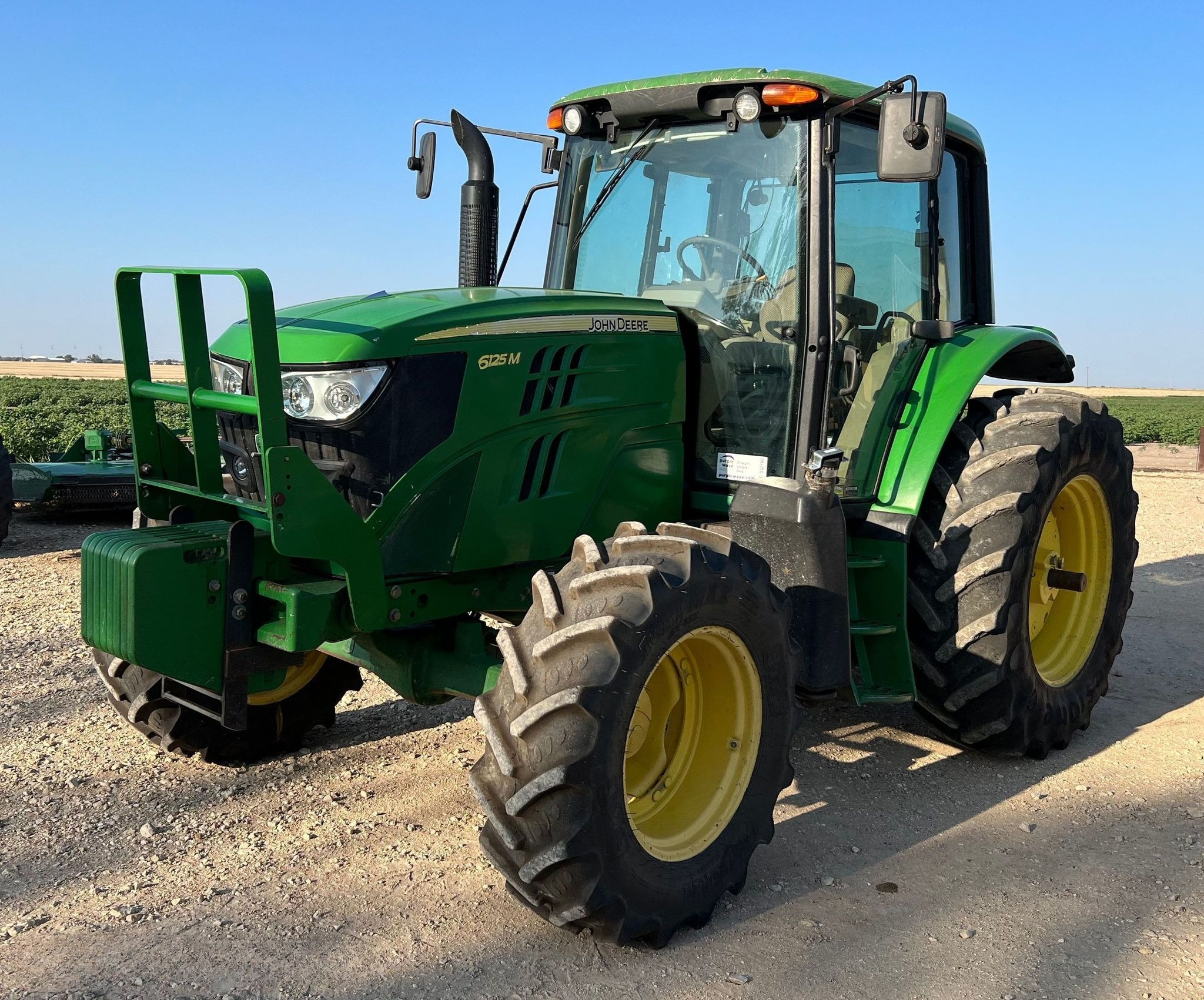 2015 John Deere 6125M MFWD